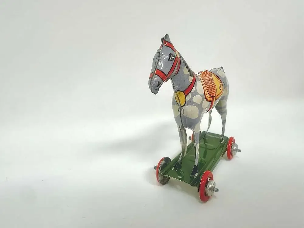 Miniature Tin Toy Horse on Wheels Vintage Penny Toy Ornament by Schylling